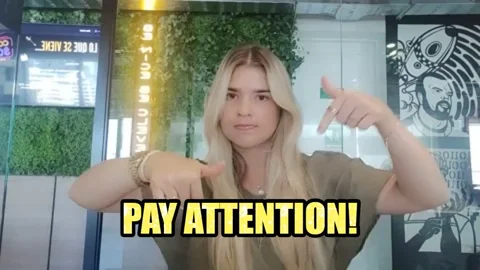 Young woman asking you to pay attention