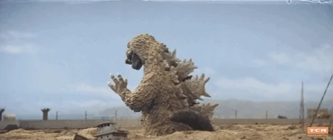 Godzilla appearing after a nuclear test.