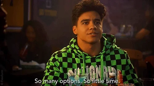 A person looks around and says, "So many options. So little time." 