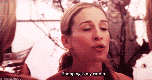 A woman talking to someone offscreen saying 'shopping is my cardio.'
