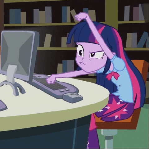 girl banging on computer keyboard