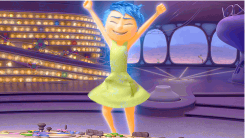 Animated girl with blue hair and green dress jumping up and down with hands in the air