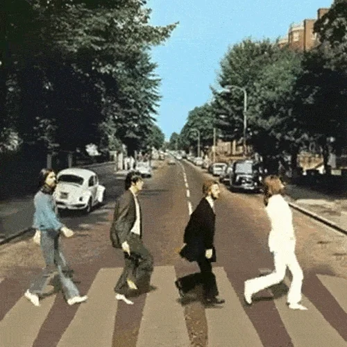 An animation showing the Beatles crossing the street on Abbey Road.