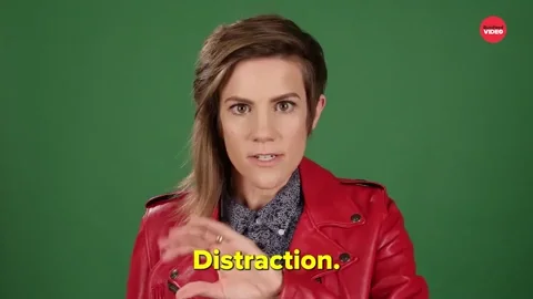 A woman gestures and says,