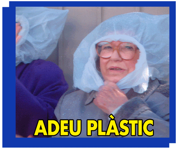 GIF of two old women smiling and waving while wearing plastic bags as caps.