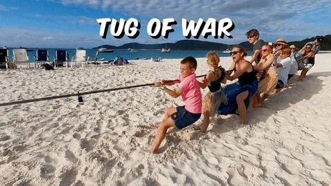 Two groups are playing tug of war