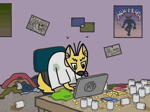 A fox sitting at a laptop in a dirty room
