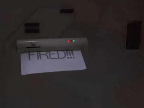 A paper that says 'You're fired!!!' emerging from a printer
