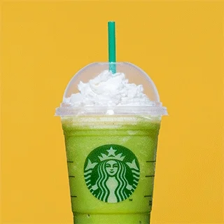 A spinning Starbucks cup changes from a blended green drink to pink to brown, all topped with whipped cream.