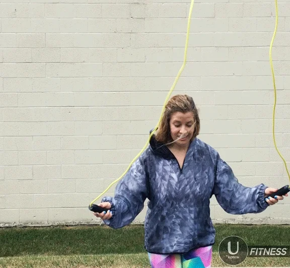 A woman jumping rope. The text reads, 