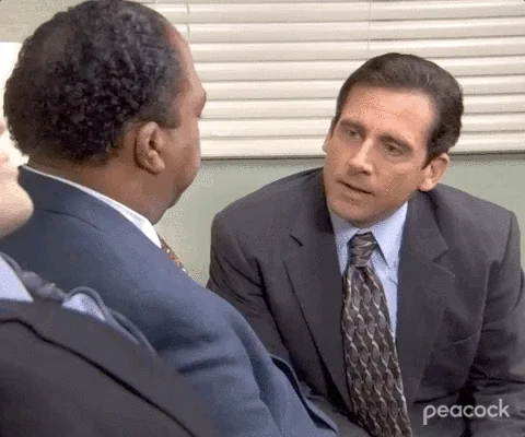 A scene from The OfficeSteve Carell asks Leslie David Baker, 