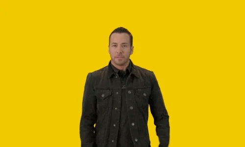 Howie Dorough from the Backstreet Boys shrugging. Caption reads 