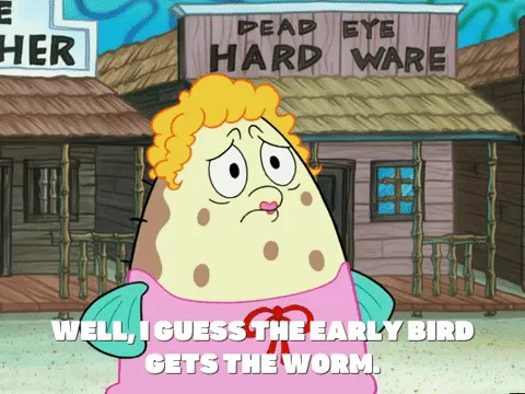 Mrs. Puff, a character from Sponge Bob, standing in front of the Dead Eye Hardware Store in Bikini Bottom.