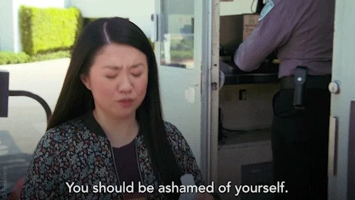 A woman saying, 'You should be ashamed of yourself.'