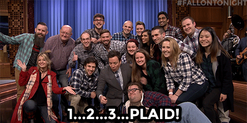 Tonight Show with Jimmy Fallon group all wearing plaid shirts cheering