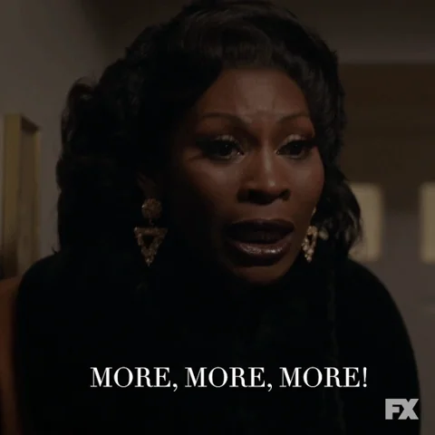 A frustrated woman shouting, "More, more, more!"