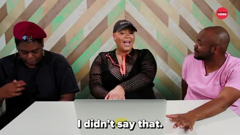A woman tells the two people in her group, 