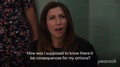 Gina from Brooklyn 99 making a confused face and saying, 