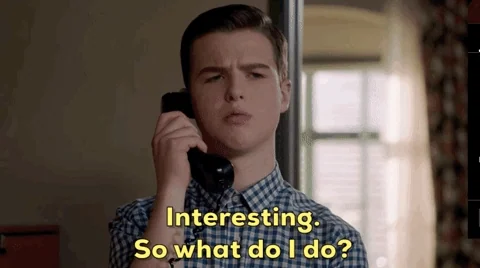 A young man on a phone saying, "Interesting. So what do I do?"