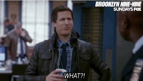 Andy Samberg from Brooklyn Nine-Nine expresses shock by saying, 'What?'