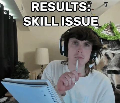 A guy in a gamer headset writes in a notebook. The text reads: "Results: Skill issue"