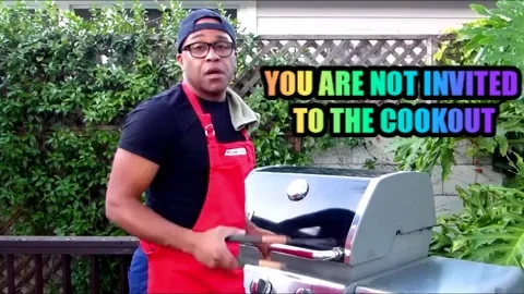 A man standing beside a grill saying, 