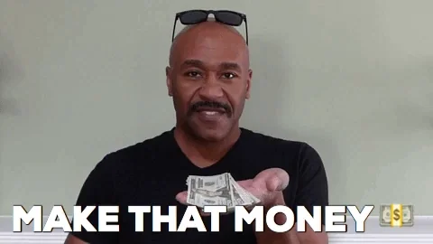 A happy man counting money.