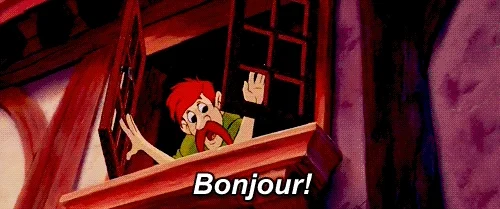 Scene from Disney's Beauty and the Beast of townspeople saying, 'Bonjour!'