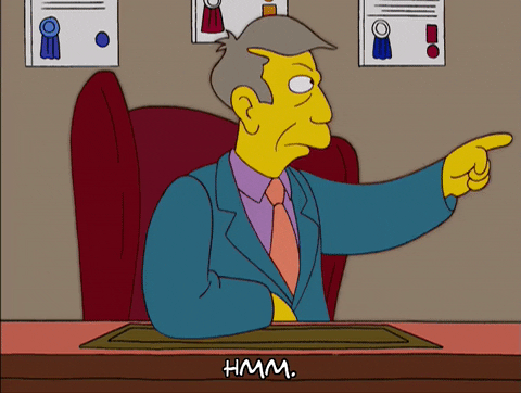 Principal Skinner from the Simpsons at his desk, pointing his hand and saying, 