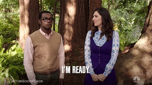 Chidi from 'The Good Place' looks ahead, speaking to Janet while overlaid text reads 'I'm ready.' 