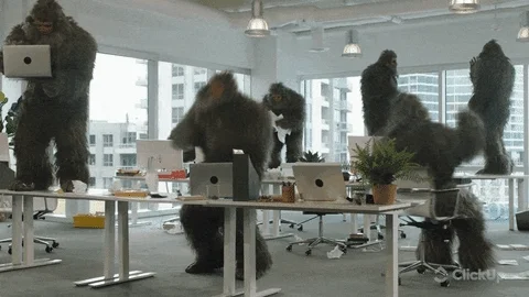 Multiple Big Foots trashing an office.