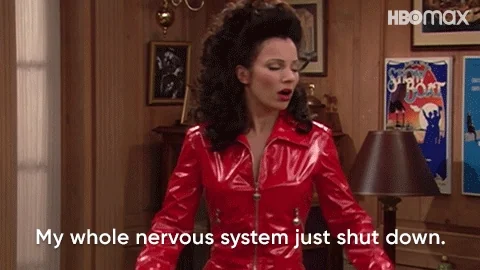 A gif of a woman saying her whole nervous system just shut down. 