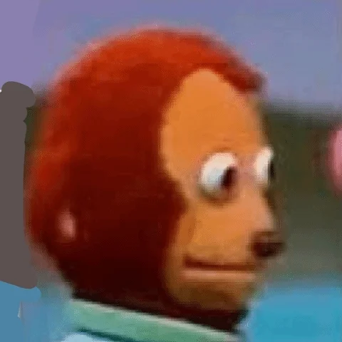 A monkey puppet moving its eyes to draw attention to an awkward situation.