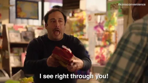 A man tells a cashier in a store, 
