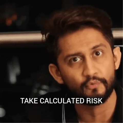 GIF showing man saying 'take calculated risk'