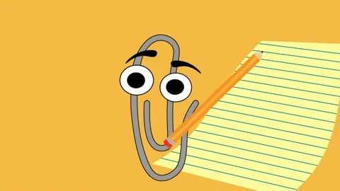 A paperclip making check marks on a sheet of lined paper.
