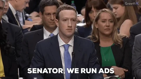 Mark Zuckerberg, CEO of META, testifying before Congress saying, 'Senator, we run ads.'
