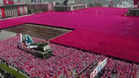 A North Korean military parade with a nuclear missile on a float.