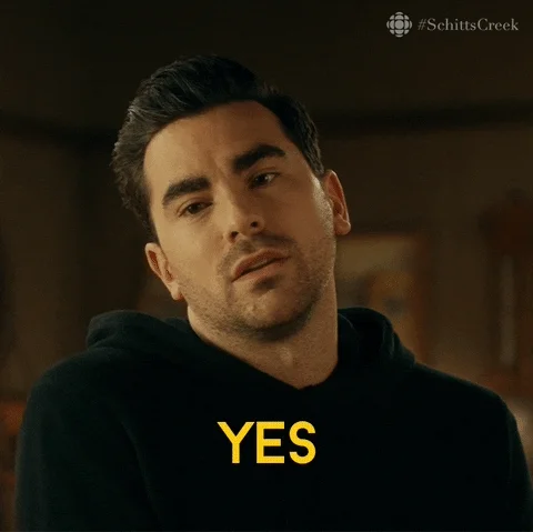 David Rose, from Schitt's Creek, nodding his head. Caption - Yes, I would like that very much.