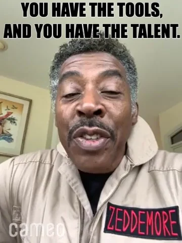 Ernie Hudson wearing his Ghostbusters outfit,. He says, 