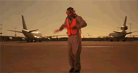 Air marshal dancing on a tarmac