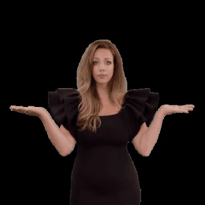A woman in a black dress moving her outstretched hands up and down to demonstrate weighing choices.