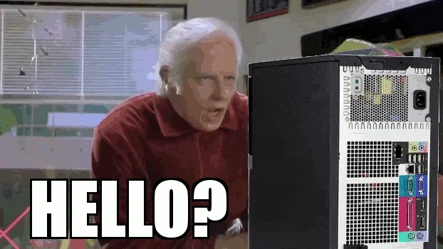 An old man knocking on a computer, saying 