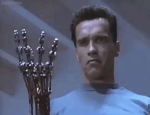The terminator showing his bionic hand