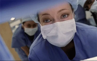 Two healthcare workers nodding their heads.