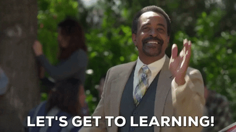 A man clapping hands saying, 'Let's get to learning!'