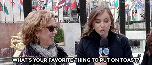 Reporter asking two women what their favorite thing to put on toast and both answering peanut butter. 