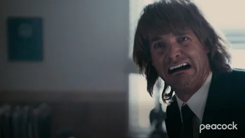 A man crying and saying 
