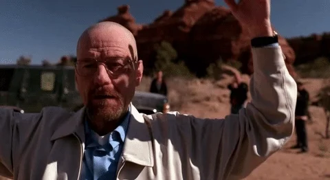 Walter White of Breaking Bad placing his hands over his head.