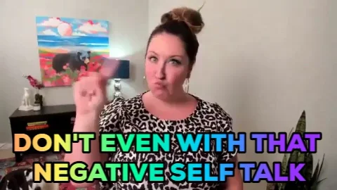A woman shakes her head and wags a finger with the words "Don't even with that negative self talk."